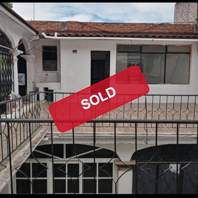 Exterior of apartments from courtyard of Oaxaca Mexico el centro house for sale