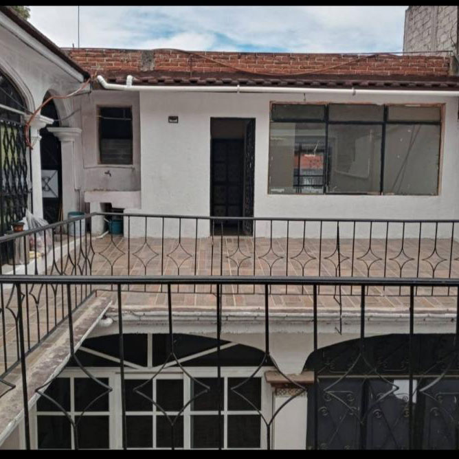 Exterior of apartments from courtyard of Oaxaca Mexico el centro house for sale