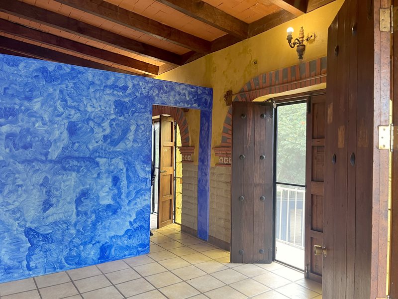 Upper floor apartment with exposed wooden beams, high ceilings and balcony doors near Oaxaca de Juarez