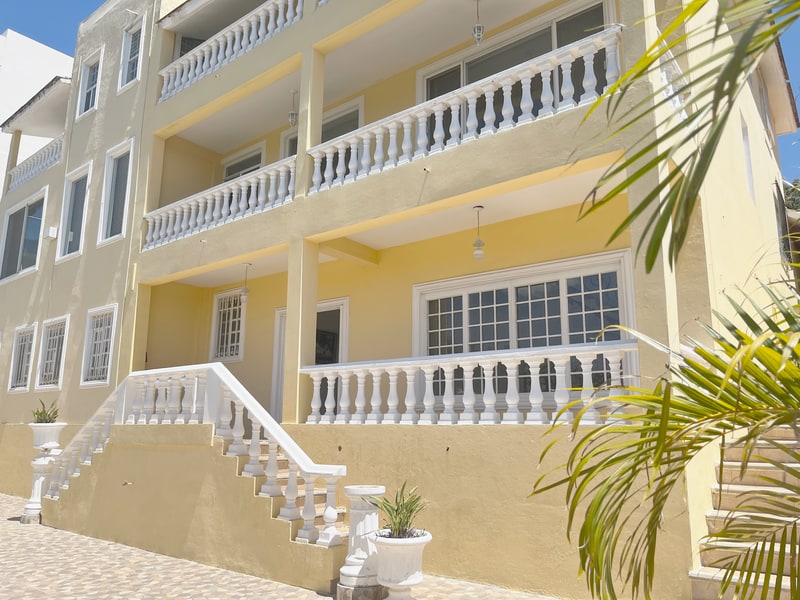 Rear facade of a luxury mansion for rent above the Hotel Plaza Fortin in Colonia Estrella, Oaxaca