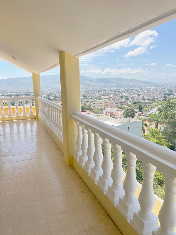 Shared second floor balcony with valley views over Oaxaca de Juarez from Colonia Estrella